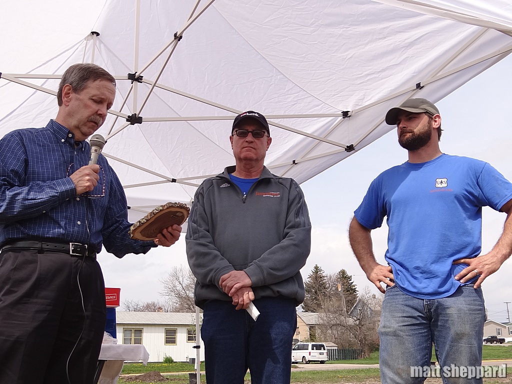 Roy Sheppard (L) receives 30 year recognition from Bob Martin (C) and City Forester Doug Wiles (R)
